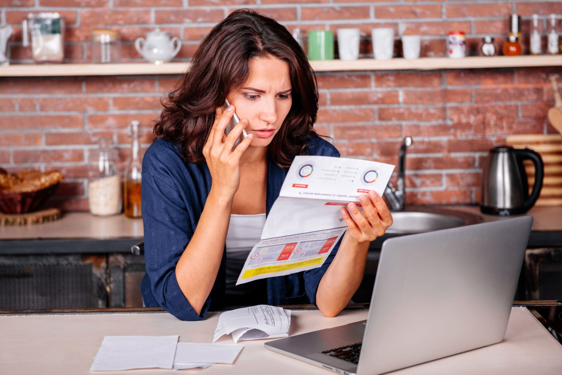 Woman looking to understand her electricity utility bill