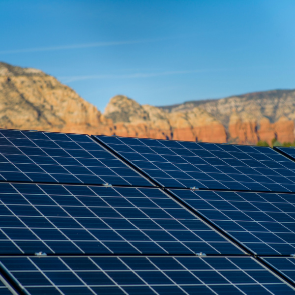 solar panels in Arizona with mountains in background