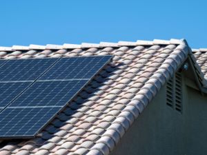 house with roof solar panel system