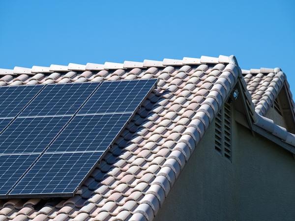 house with roof solar panel system