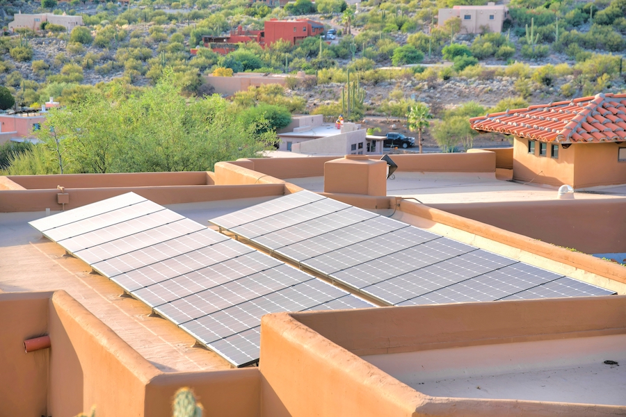 solar panels on a flat roof of a mediterranean house in arizona