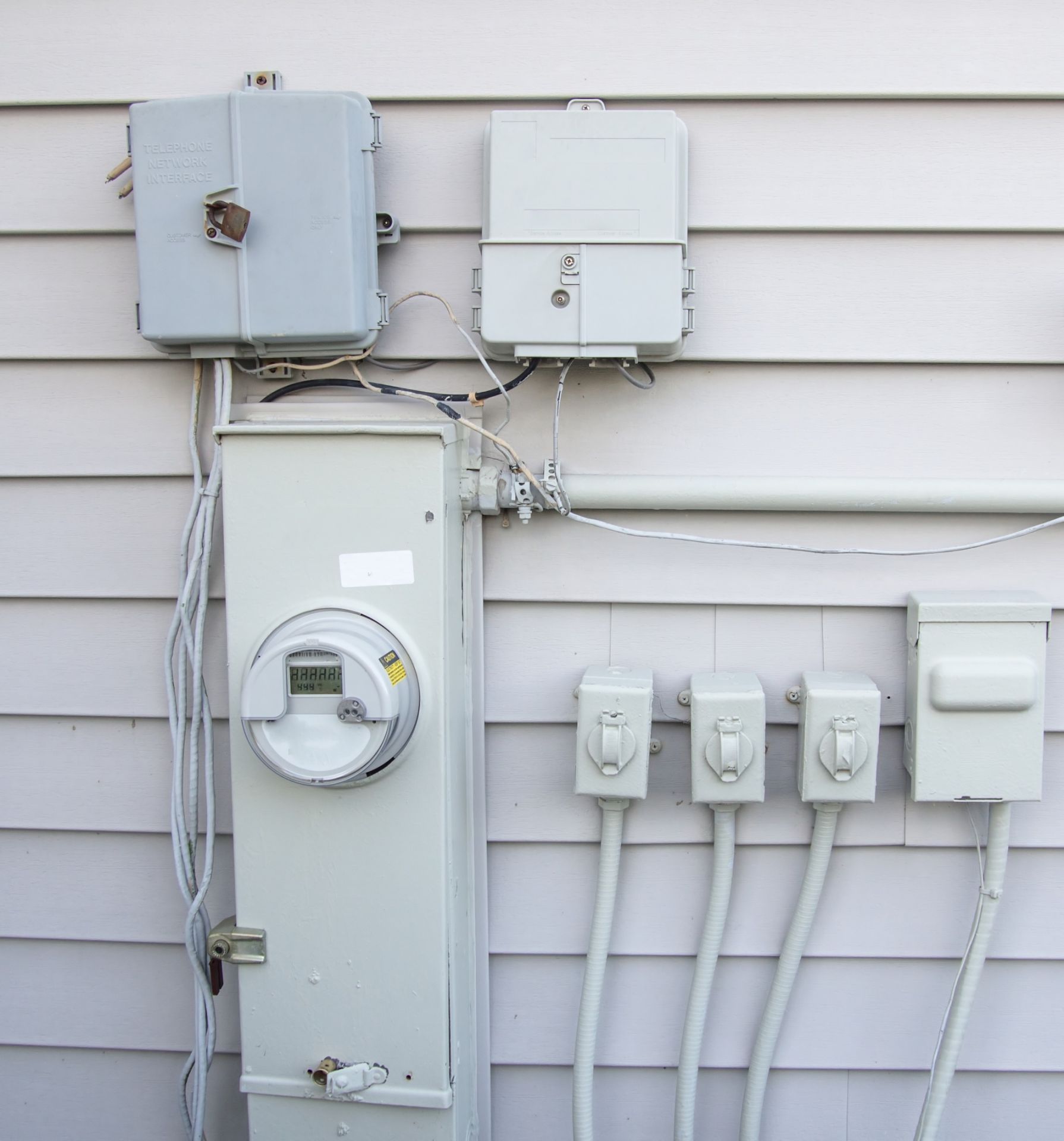 electric meters in the back side of apartment