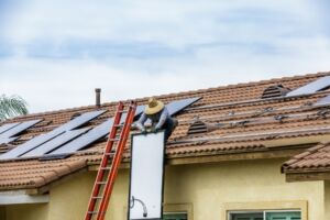 Man preparing to install solar panel