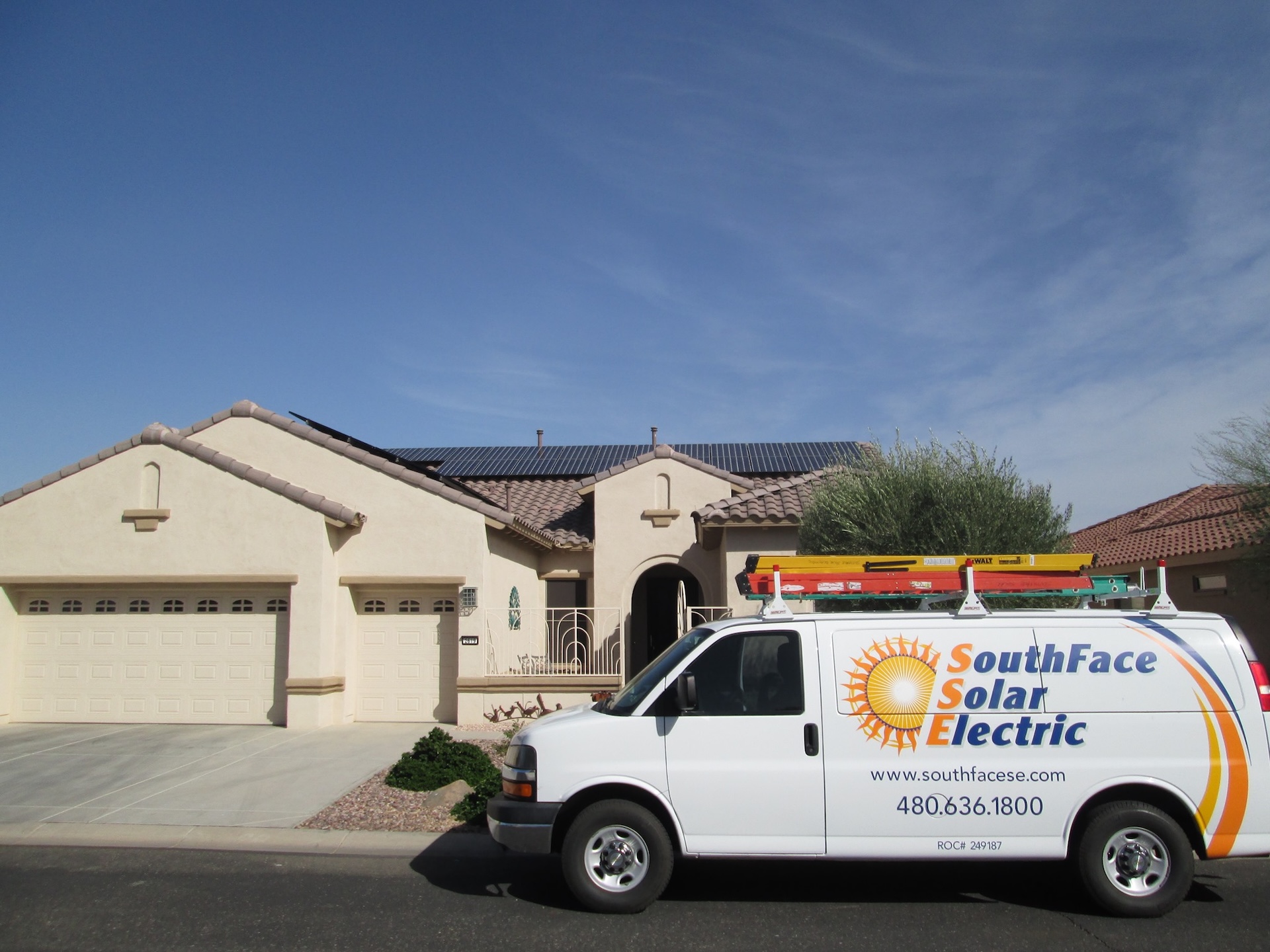 SouthFace Solar truck parked outside of home with new solar panels installed on roof