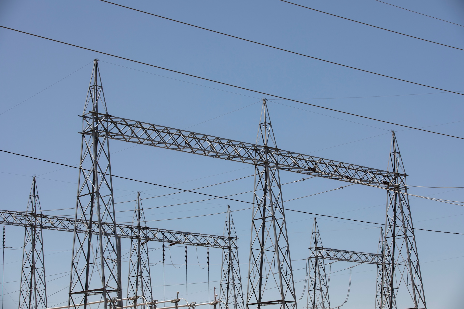 Sunny daytime view of power lines of an electrical substation in downtown Phoenix, Arizona