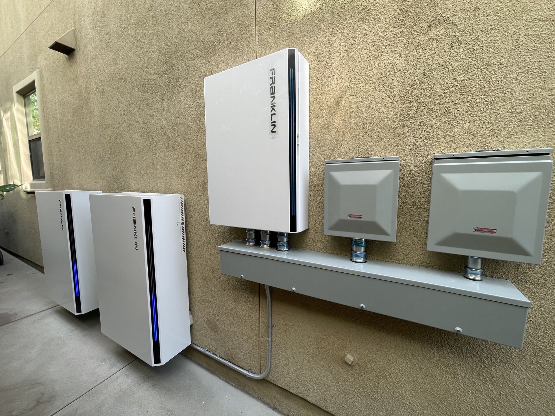 Franklin Batteries on a wall outside the home